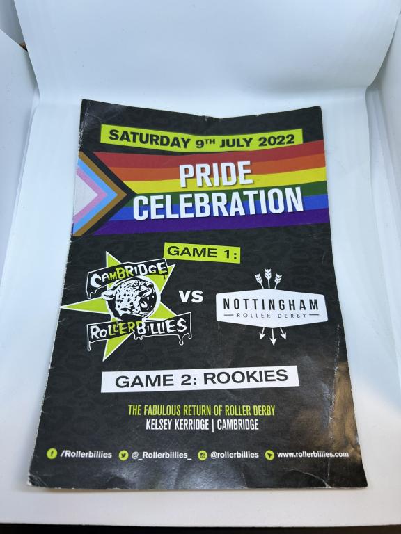 Image shows a pride program from the Cambridge Rollerbillies home game against Notingham Roller Derby. 
