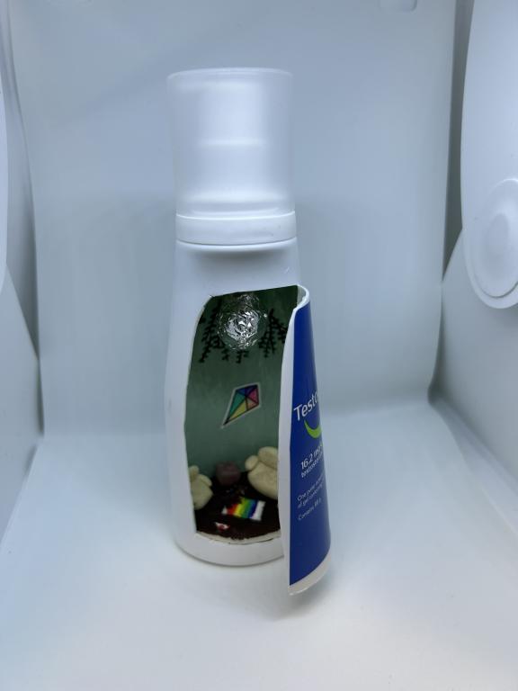A bottle of t-gel that has been converted into an art piece