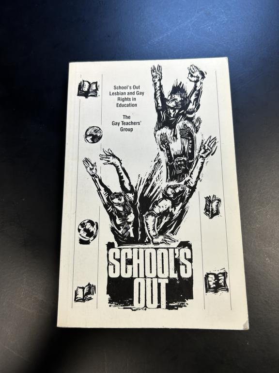 White document with black images and the phrase "schools out"