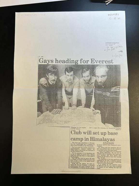 photocopy of a newsletter featuring a picture of 4 men looking at the camera