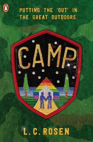 A green book cover with a shield made of sequins. Camp is in gold at the top with two blue figures joining hands in front of a rainbow tent and a tree either side. 